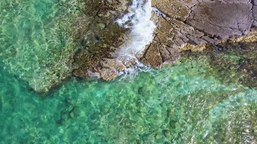 Aerial Top View of Turquoise Sea Waves Small Waves Calmness and Relaxation