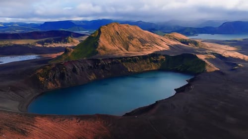 Aerial Glide Over Ljotipollur Crater Lake in Iceland Highlands