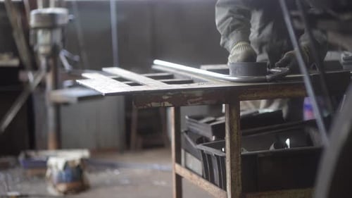 A man working in a town factory