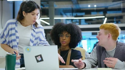 Young Adults Teamwork at a Modern Workplace