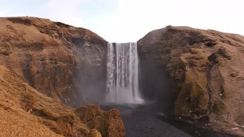 Majestic Skógafoss waterfall cascading over cliffs in Skógar, Iceland, natural beauty