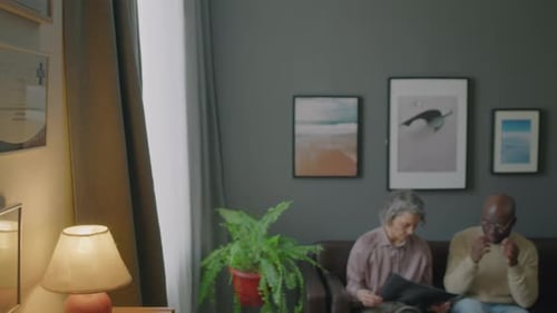 Man and Woman Examining Medical Scans
