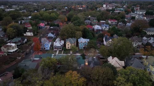 Colorful house in American neighborhood at dusk in autumn. Single family homes in suburb of Michigan