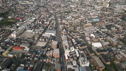 Aerial Scenic Urban Drone Footage of a neighborhood, streets and buildings in the Capital City of To