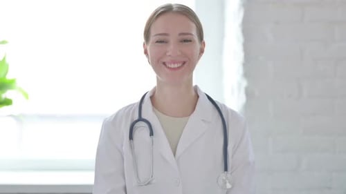 Smiling Doctor in White Coat with Stethoscope