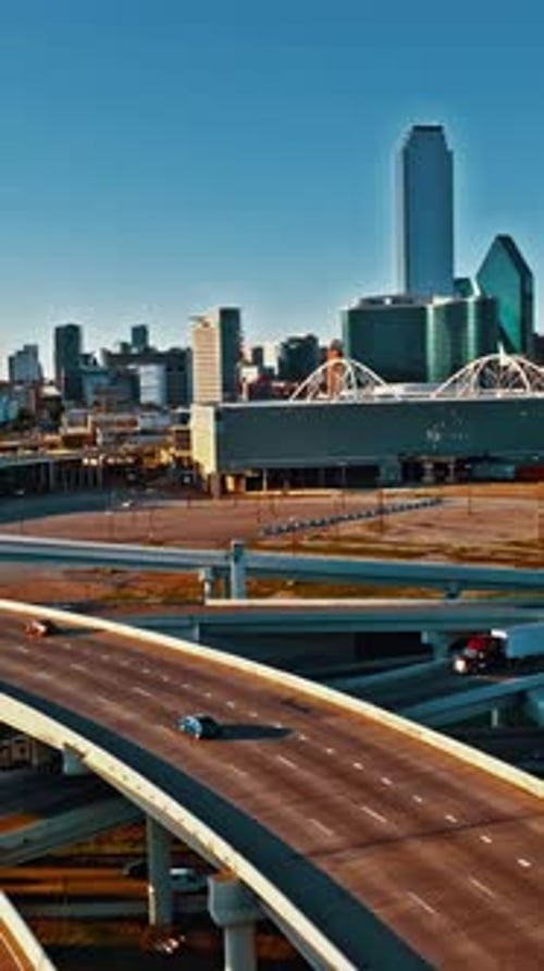 Aerial view of Dallas showcasing its skyline and highways