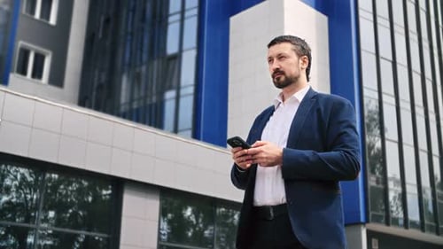 Pensive Fashion Male Boss White Shirt Suit Chatting Use Smartphone App Outdoor Downtown Office City