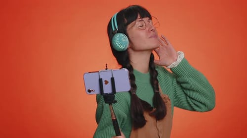 Woman Traveler Blogger Taking Selfie on Mobile Phone Dancing Video Call Online with Subscribers