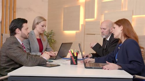 Collaborative Business Meeting in Modern Office
