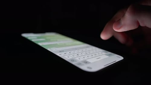 Phone close-up - people communicate using messenger, chat