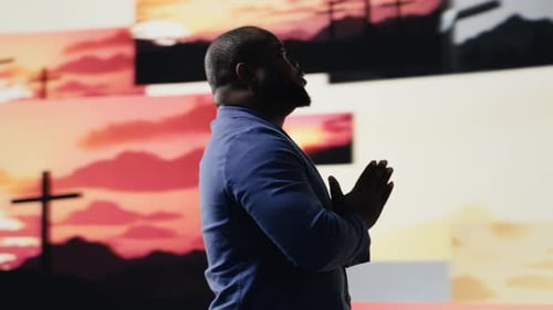 Spiritual Believer Meditates on Faith and Holiness in a Pose of Worship