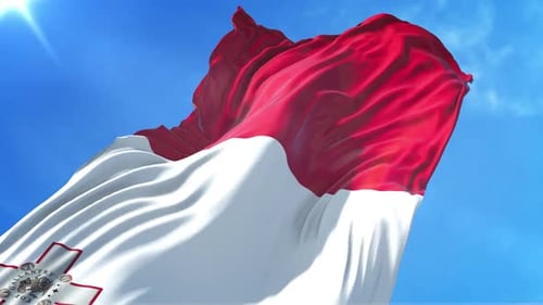 Realistic Waving Flag of Malta Against Blue Sky