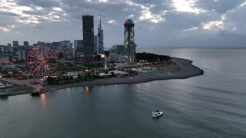 Aerial view of Batumi university and Alphabetic tower, skyscrapers and embankment of Batumi city