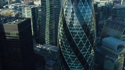 London skyline in the early morning, featuring the gherkin and london skyline