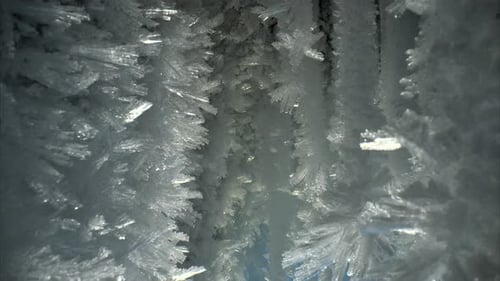 Closeup View of Blue Ice Crystals in a Frozen Cave Smooth Slider Movement