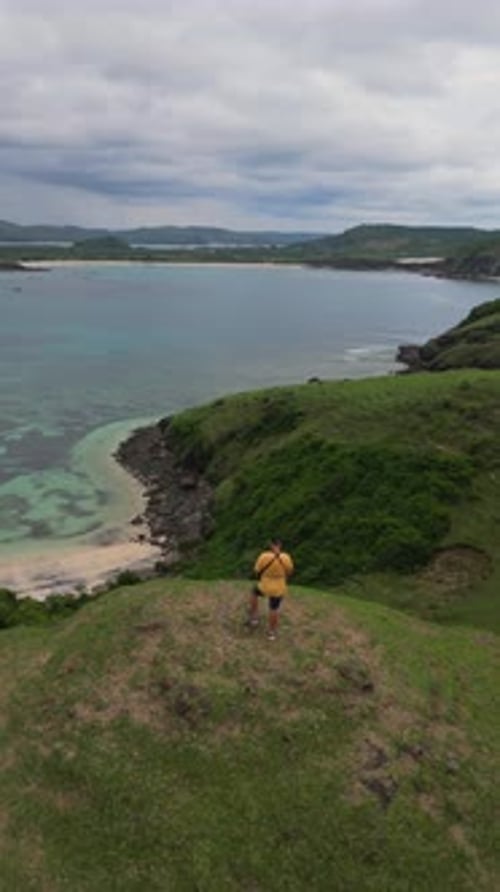 Drone Captures Serene Scene with Vibrant Reef and Quiet Waters