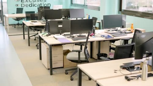 Modern and Empty Office Space with Desks