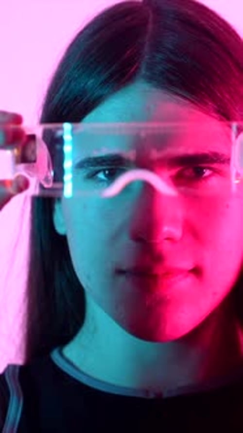 Futuristic Studio Portrait with Neon Lights of an Androgynous Person Experimenti