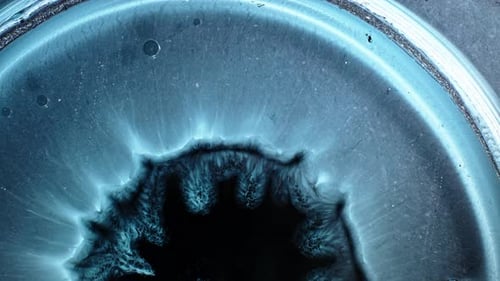 Vibrant Shot of Substances Mixing, Creating Dynamic Patterns and Textures