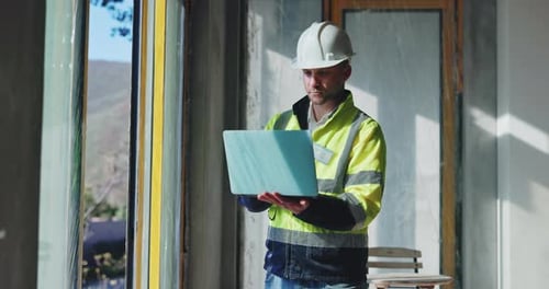Building, laptop and architecture with man on construction site for project management