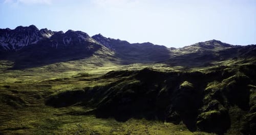 Majestic Mountain Landscape Under Bright Blue Sky During Daylight