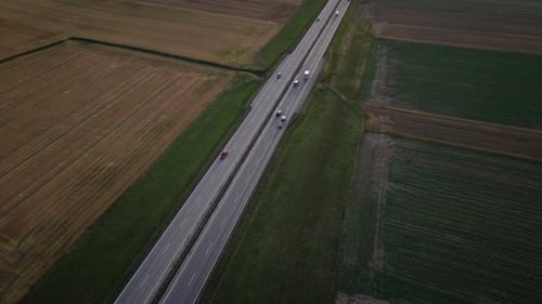 Aerial View of Highway Road with Car Traffic in Countryside