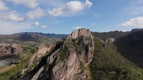 Aerial View of Majestic Mountains and River Valley Capturing the Beauty of Nature's Landscape
