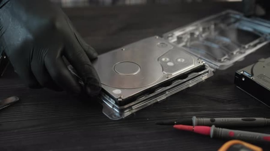 Computer Technician Opening Package With New Hard Disk Drive For ...
