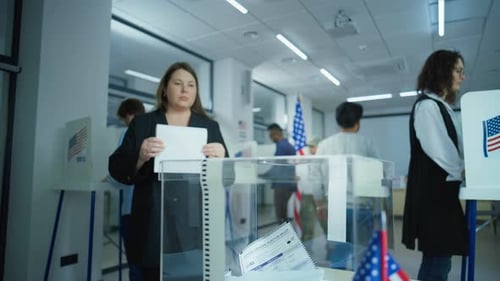 People Voting in Modern Urban Polling Place