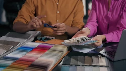 Unrecognizable Woman Man Fashion Designers Choosing Buying Textile in Atelier Select Materials