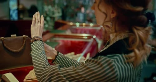 19 Century Beautiful Young Woman Choosing Jewelry in Store Details Prores