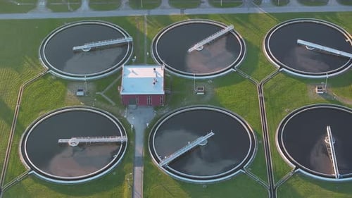 Modern wastewater treatment plant aerial view showcasing purification process