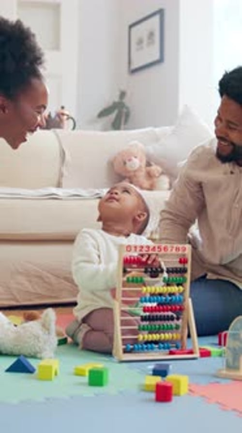 Loving Family Playing with Infant at Home