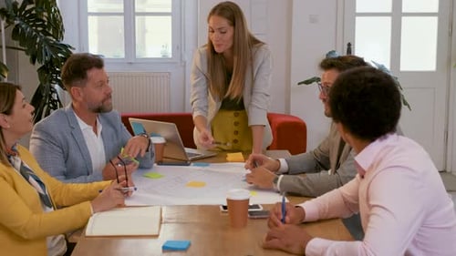 Group of business people working in office.