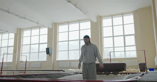 Ternopil Ukraine September 29 2019 Male Athlete Jumping on a Trampoline Doing Body Flips and