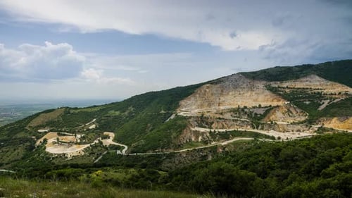 Quarry for Extraction of Minerals with Equipment and Machines and Road in Rhodope Mountains Covered