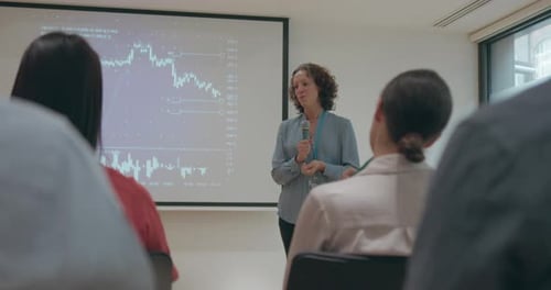 Businesswoman Presenting at Conference