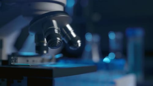 Microscope in Dark Blue Lab Setting