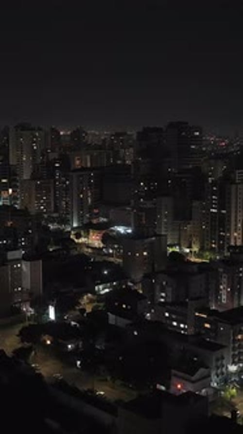 Curitiba city lights in South Brazil under the dark Curitiba night sky horizon
