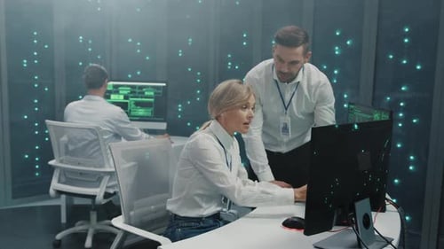 IT Professional Team Cooperating in Modern Data Center Bearded Manager Reading Great News and