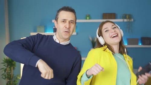 Dancing Man and Woman Having Fun Indoors