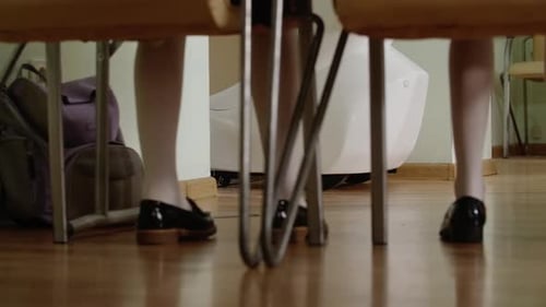 Robot teacher futuristic school entering classroom full of students ground shot with kids shoes and