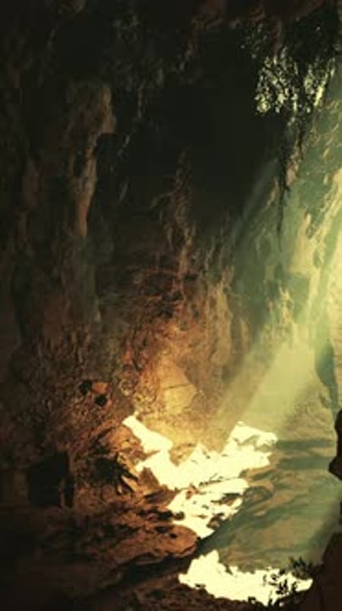 A Cave Filled with Lots of Rocks and Water
