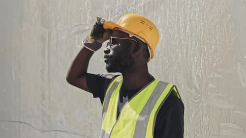 Black Quarry Worker On Sunny Summer Day