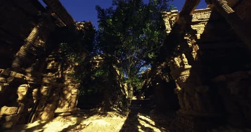 Sunlit Ancient Ruins Amid Lush Greenery in a Tranquil Setting