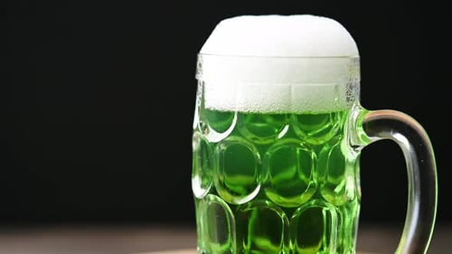 Green beer mug with foam for St. Patrick’s Day