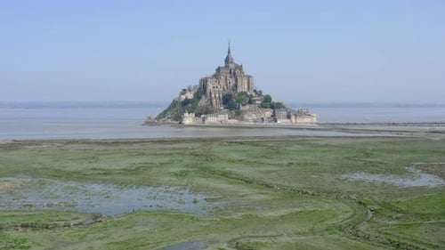 Flight towards Mont Saint-Michel slowly closing in and decreasing the altitude of camera finishing w