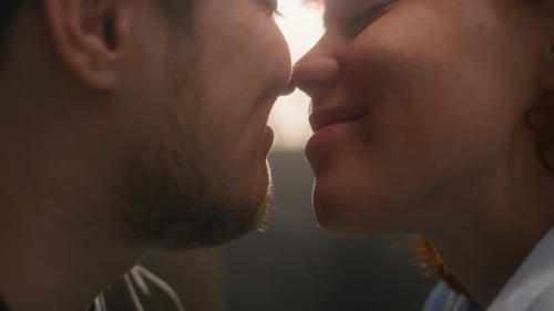 Close Up of Loving Couple Kissing Indoors