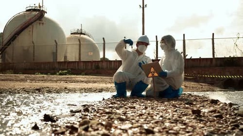 Scientists Collect Samples in Polluted Industrial Area