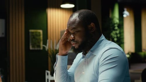 Exasperated Black Guy in Tension Getting Angry Due to Intense Workload